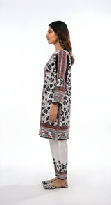 Black and white floral printed 2-piece suit, profile view